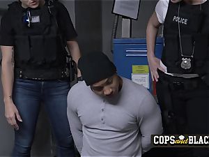 Burglar takes turns to screw milf cops at their intimate spot